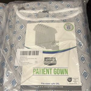 Total of 9 hospital gowns, new untouched